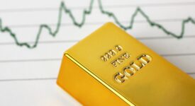 Gold prices decline after reaching record high